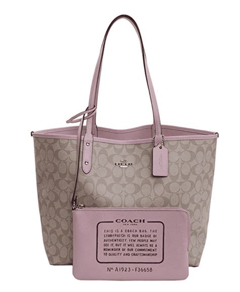 coach reversible tote with pouch.